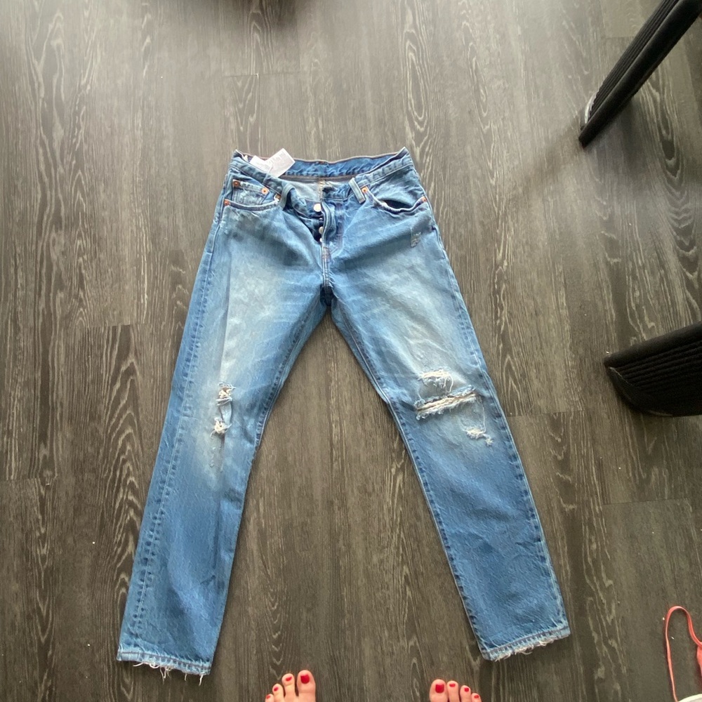 Levi’s mid wash mid rise jeans